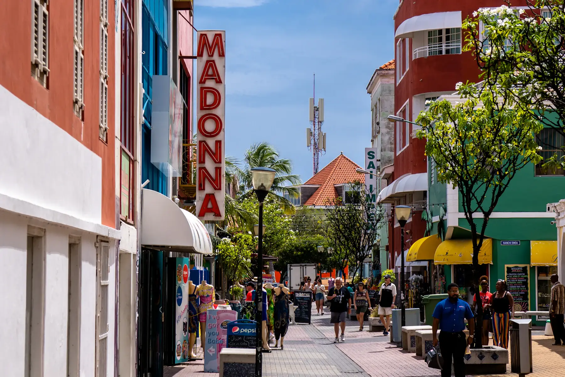 Pedestrians among the colourful buildings of Punda in Willemstad