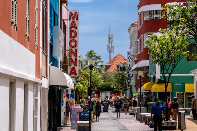 Pedestrians among the colourful buildings of Punda in Willemstad