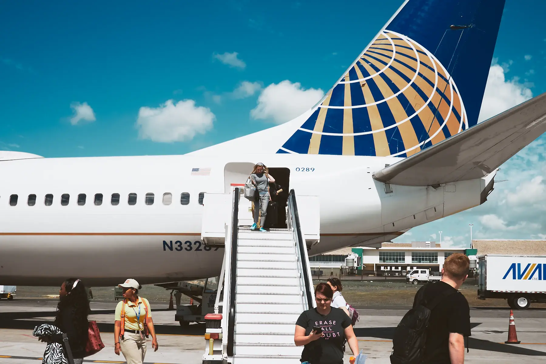Pasaheronan banda di un avion na aeropuerto internashonal di Punta Cana